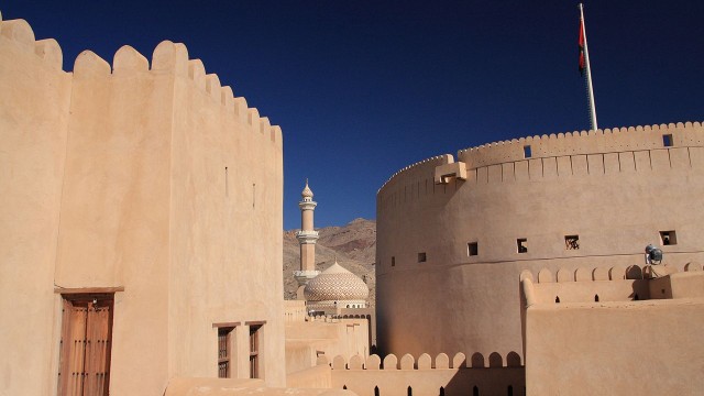 The Nizwa Fort is a large castle in Nizwa, Oman.